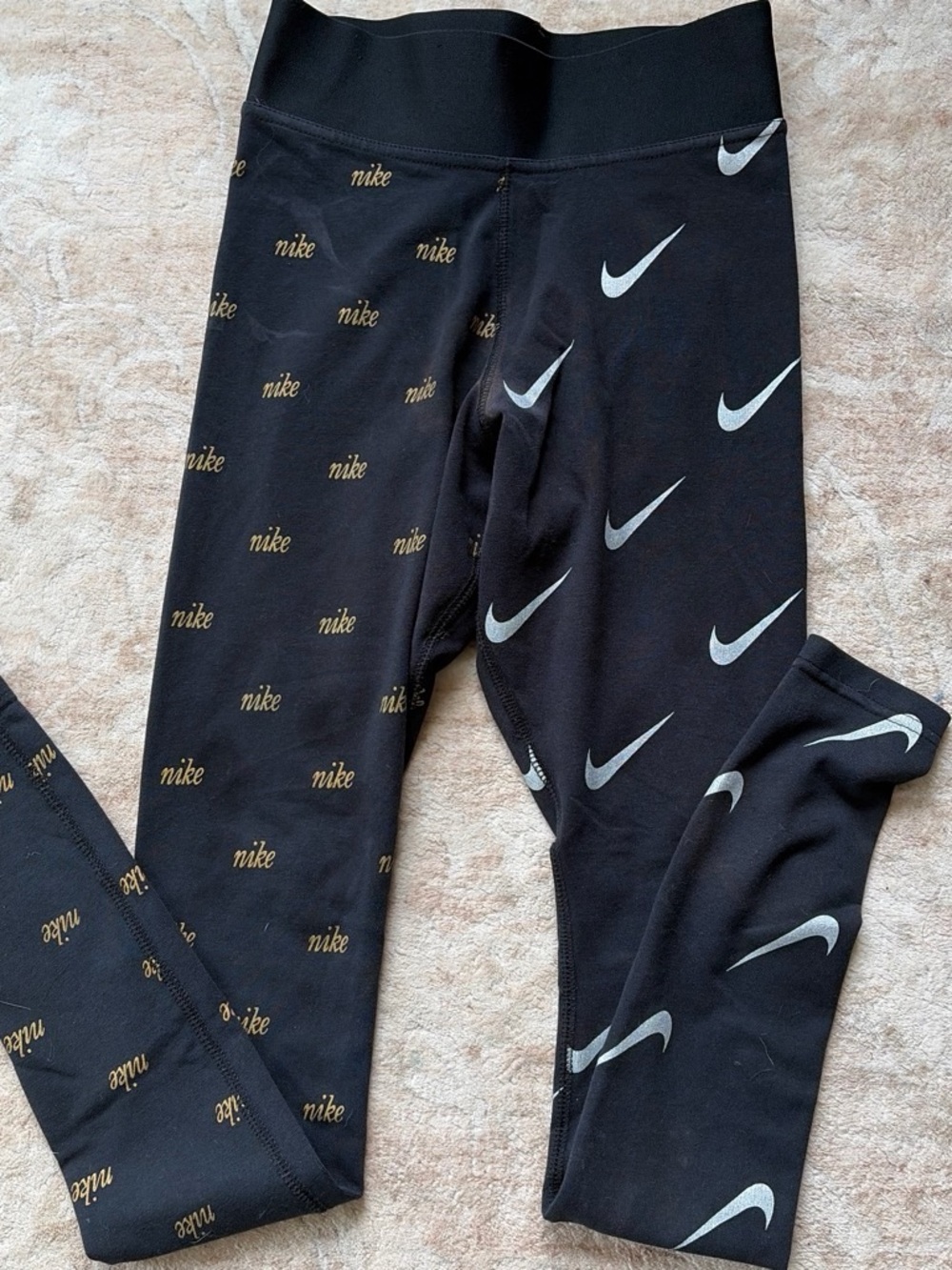 Nike Black Leggings with White Swoosh and Gold Logo Print